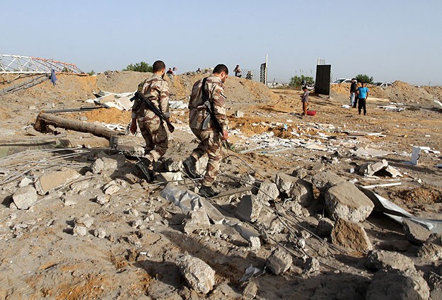 İsrail Kassam Tugayları'na ait askeri sahaları bombaladı