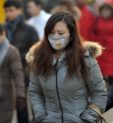 Çin'deki hava kirliliği maske taktırdı