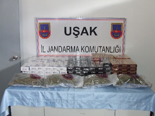 Uşak'ta esrar ve kaçak sigara ele giçirildi